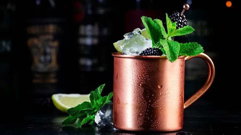 cocktail served in a copper mug crossword