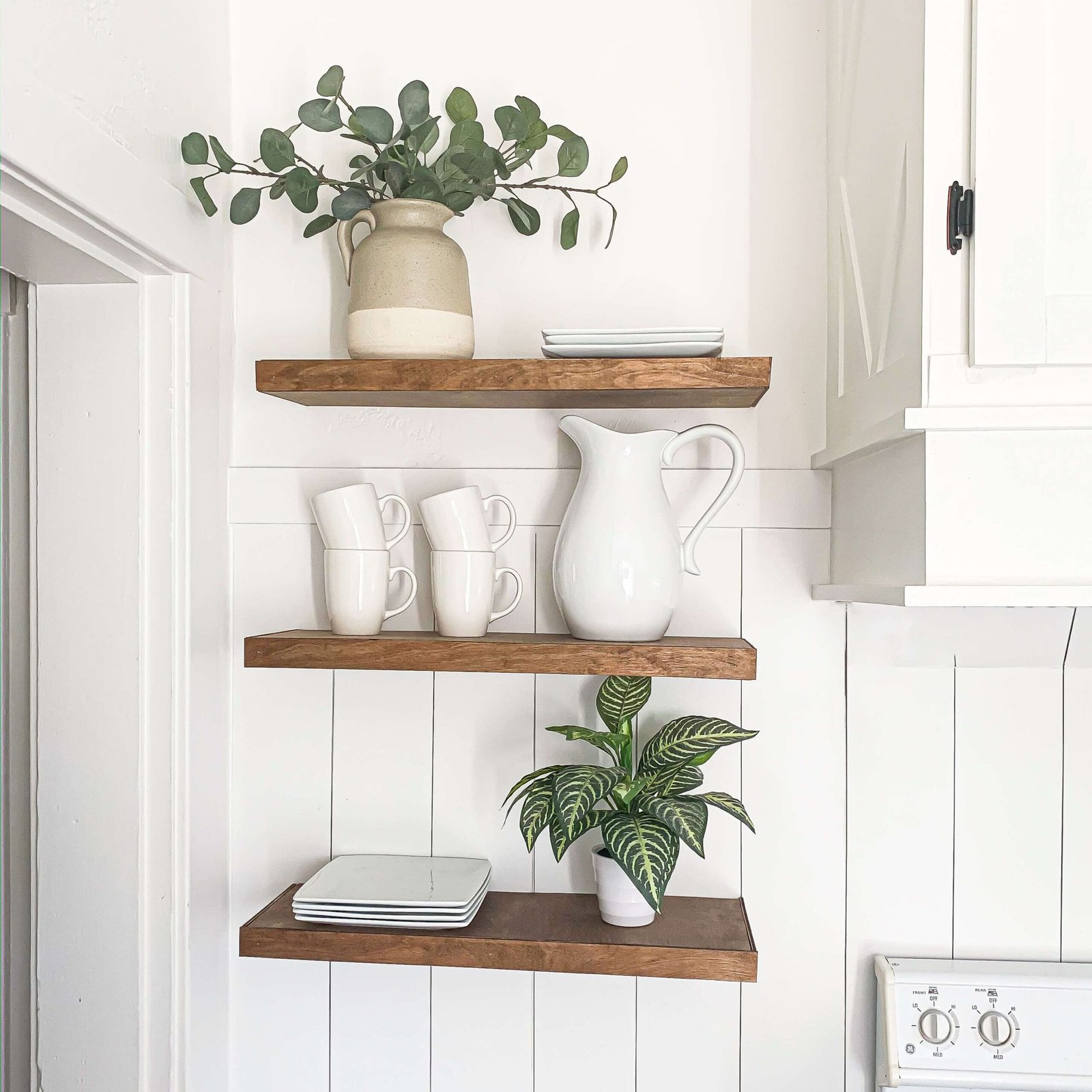how to decorate floating shelves in kitchen