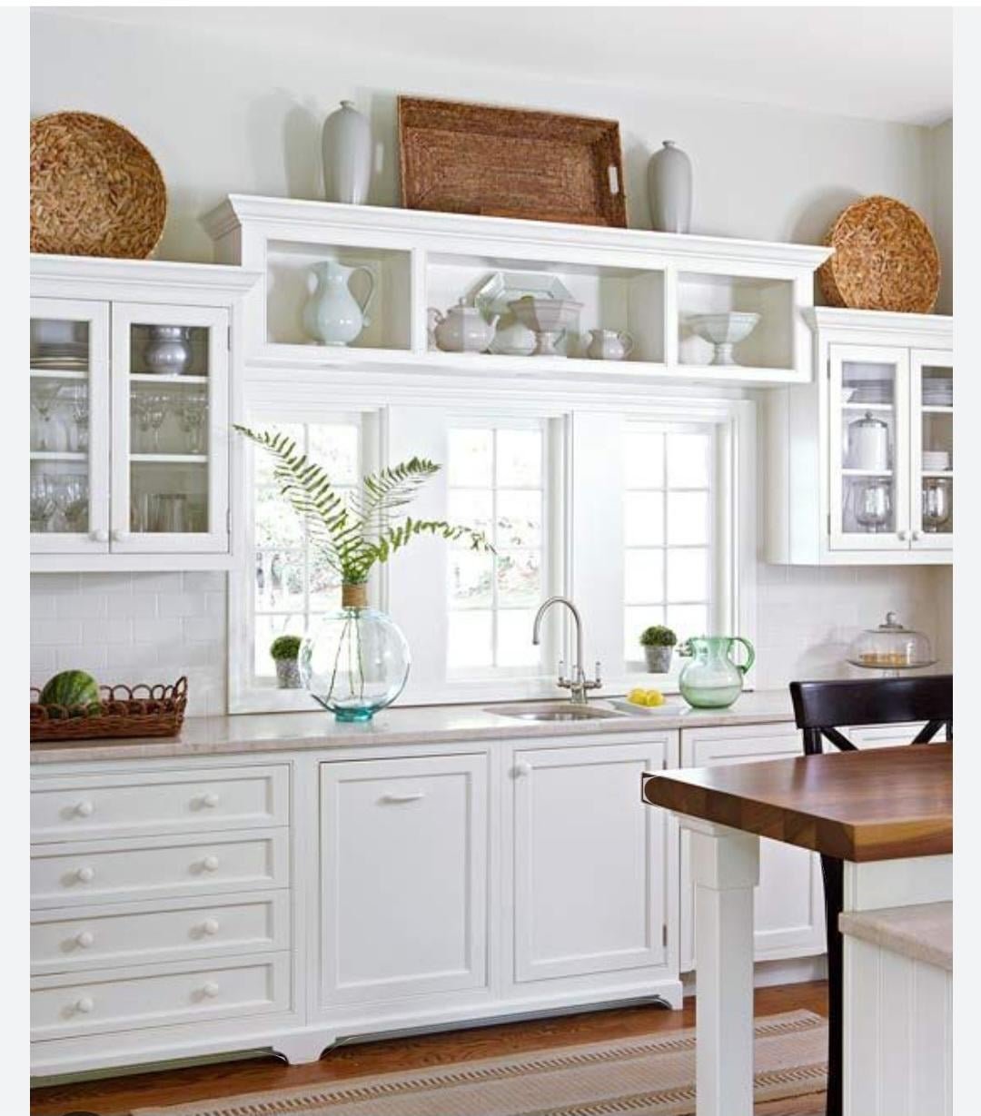 how to decorate on top of kitchen cabinets