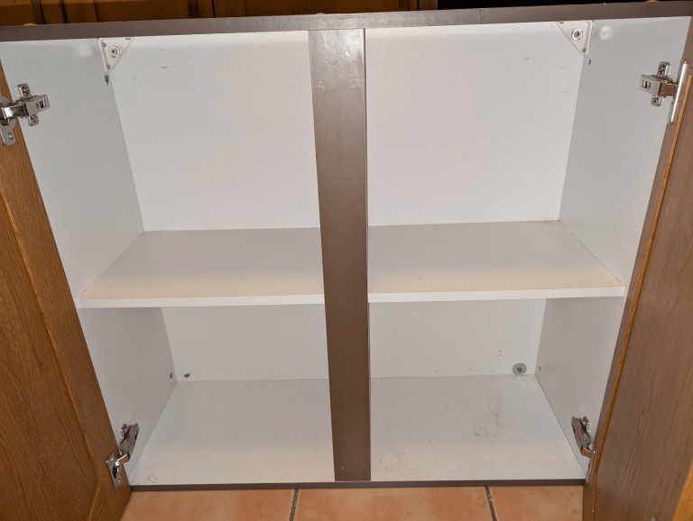 How to Install Kitchen Cabinets on Plaster Walls: Easy Expert Guide 15 Installed kitchen cabinets securely mounted on plaster wall