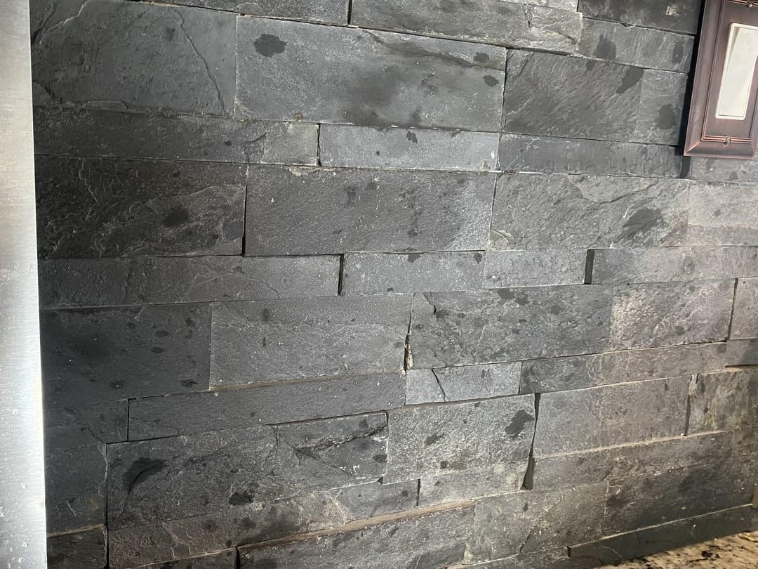 Clean grease-free kitchen wall after deep cleaning
