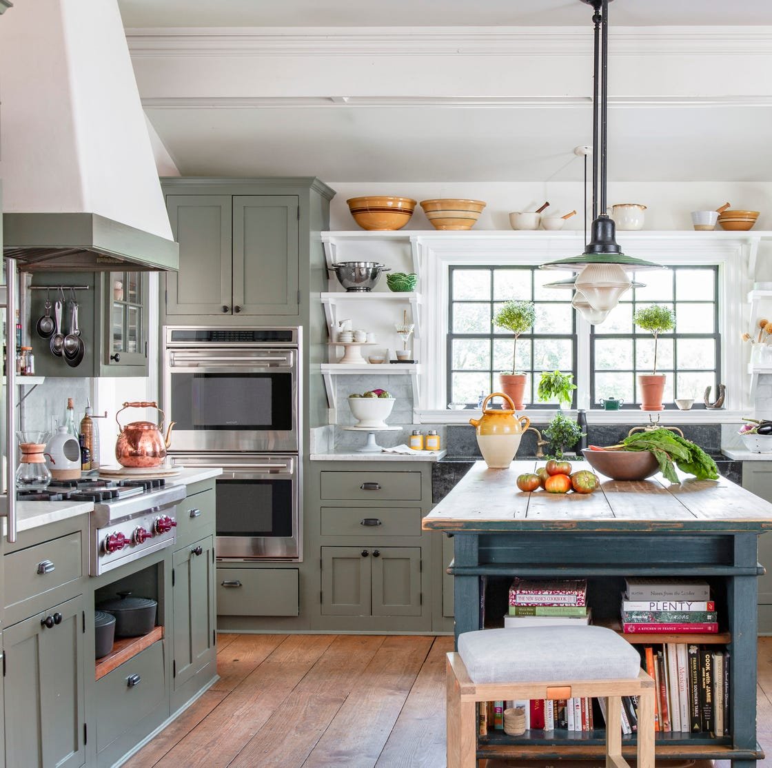 Modern kitchen wall decorated with floating shelves and plants