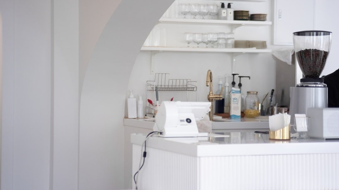 Pale Blue Walls in White Kitchen