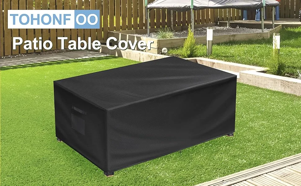 outdoor furniture protective cover draped over table